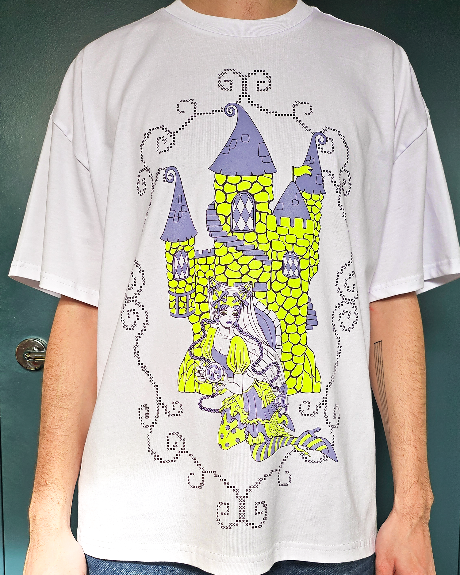Loose fit t-shirt with a castle and princess screen printed on the front.